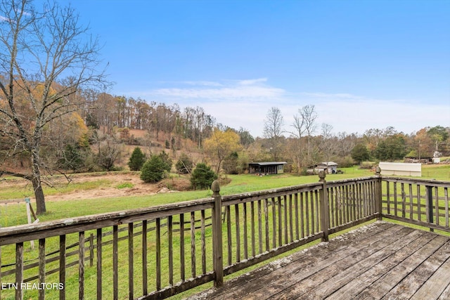 wooden deck with a yard