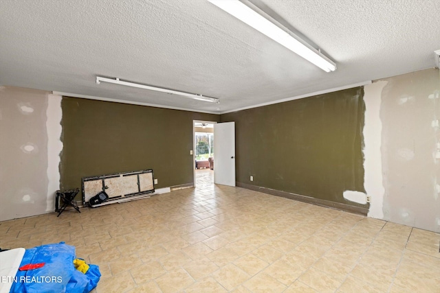 empty room with a textured ceiling