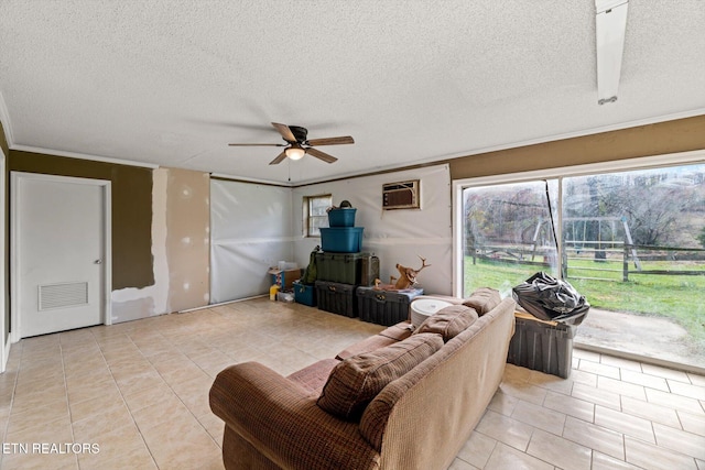 tiled living room featuring ceiling fan, a textured ceiling, and a wall mounted AC