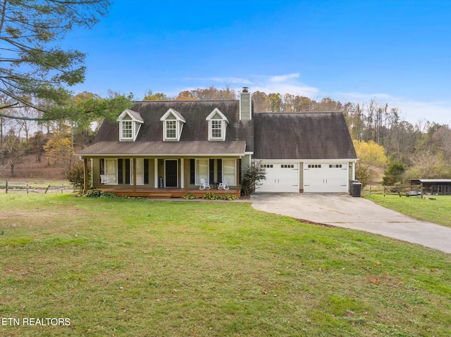 new england style home featuring a garage, covered porch, and a front lawn