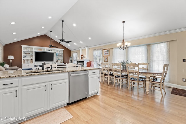 kitchen featuring dishwasher, light hardwood / wood-style floors, white cabinetry, and sink