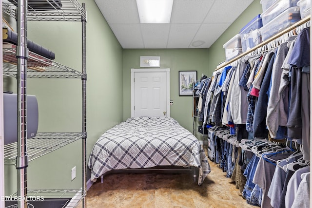 interior space with a drop ceiling