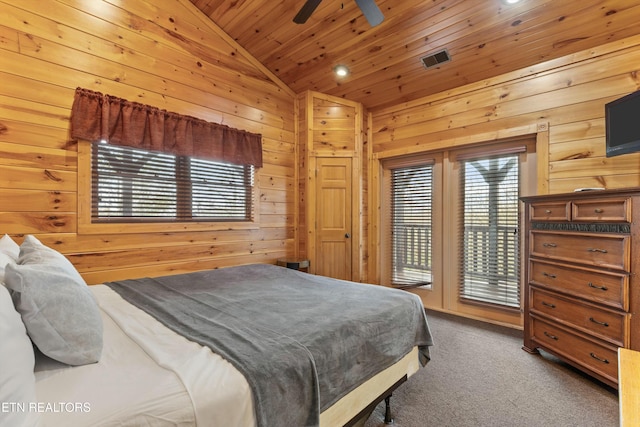 carpeted bedroom with ceiling fan, wood walls, lofted ceiling, access to outside, and wood ceiling