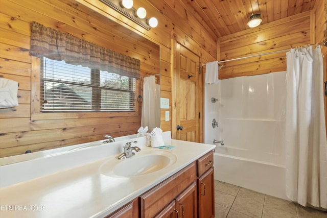 bathroom featuring wooden ceiling, tile patterned flooring, wooden walls, shower / bath combo with shower curtain, and vanity