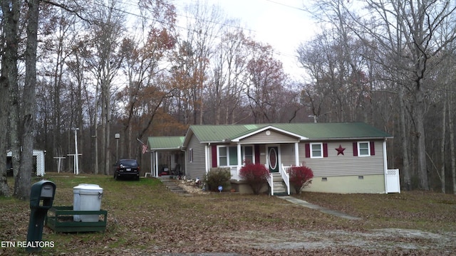 view of front of home featuring covered porch