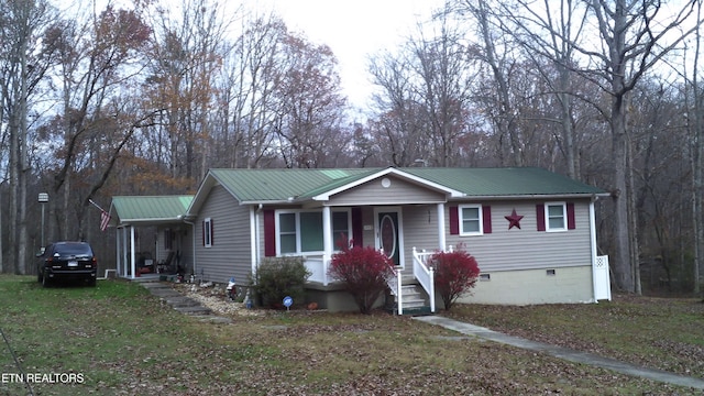 view of front of house with covered porch and a front yard