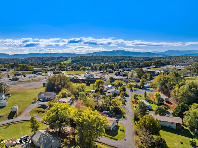 drone / aerial view featuring a mountain view