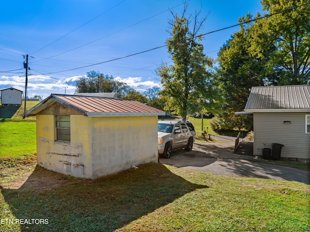 exterior space with a yard