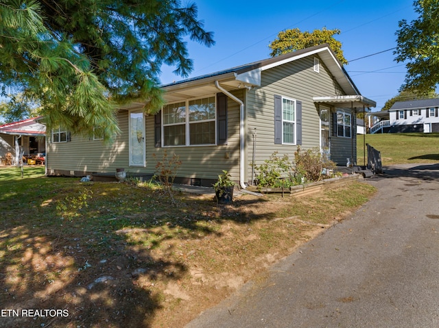 view of front of house with a front yard