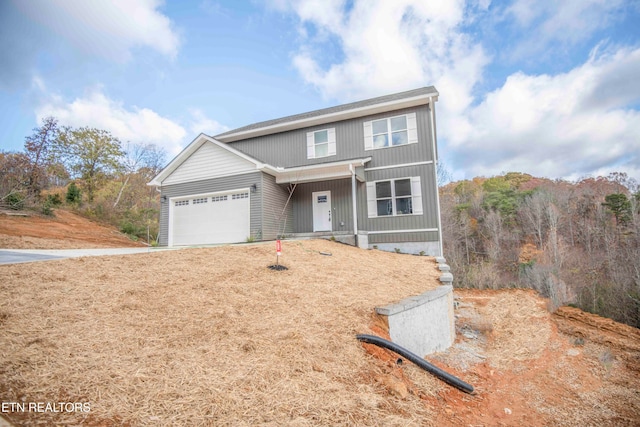 front of property featuring a garage