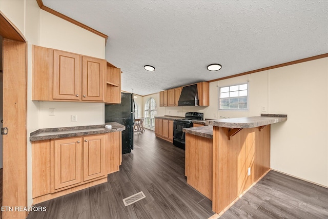 kitchen with dark hardwood / wood-style flooring, premium range hood, kitchen peninsula, a textured ceiling, and black appliances