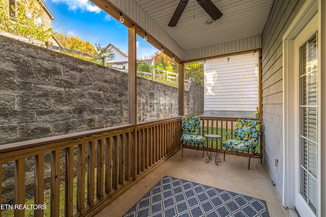 balcony featuring ceiling fan