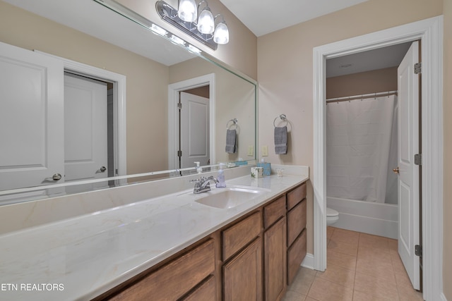 full bathroom featuring tile patterned flooring, vanity, toilet, and shower / tub combo with curtain