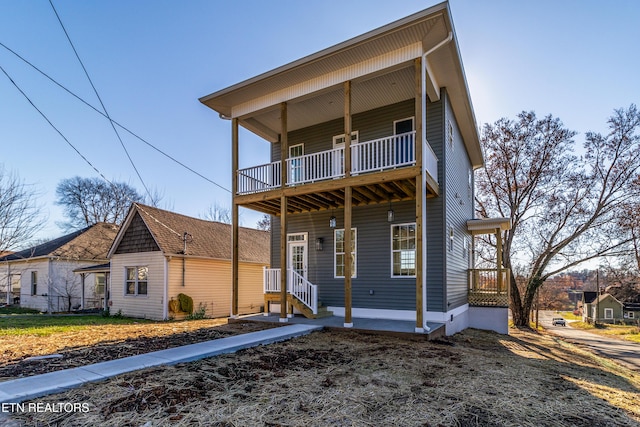 view of front of home with a balcony