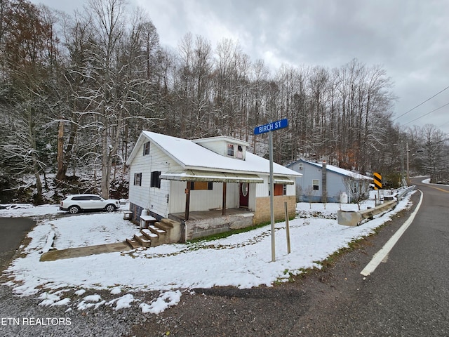 view of snow covered property