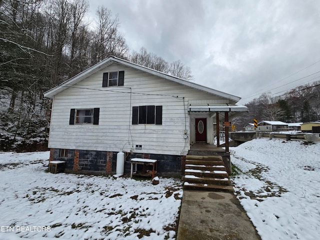 view of front of property featuring central AC unit