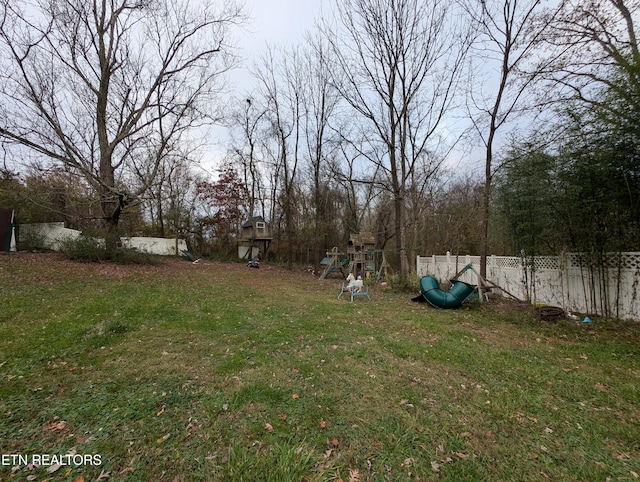 view of yard featuring a playground