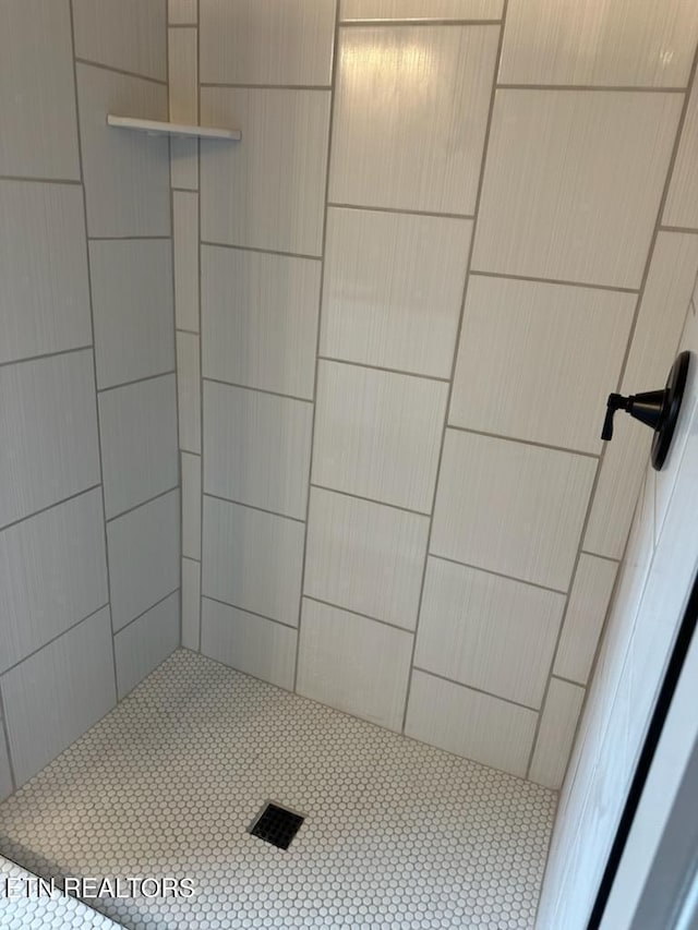 bathroom featuring walk in shower