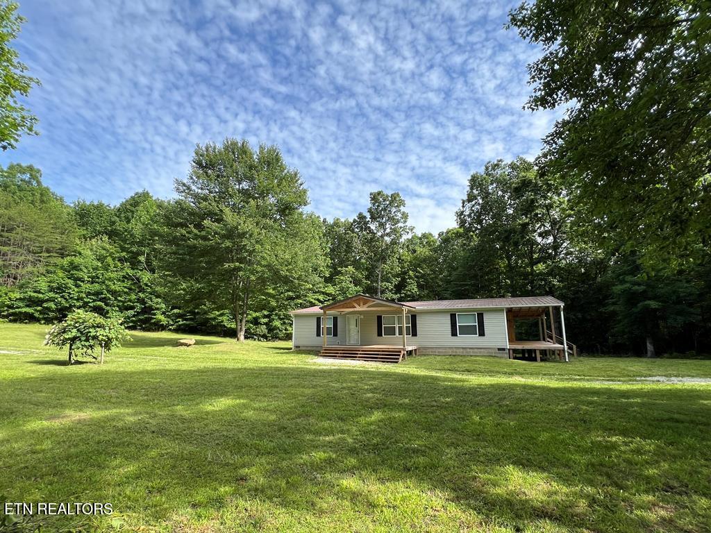 exterior space with a lawn