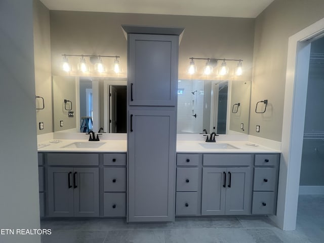 full bath with a spacious closet and vanity