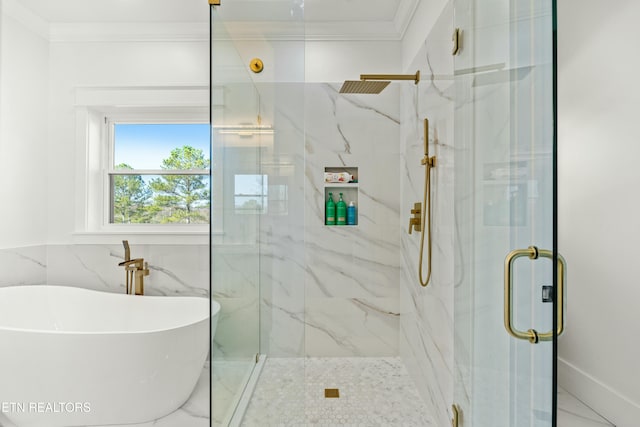 bathroom featuring shower with separate bathtub, tile walls, and ornamental molding