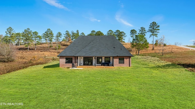 view of front of home with a front lawn