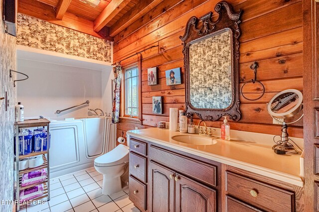 bathroom featuring vanity, wooden ceiling, tile patterned flooring, toilet, and beamed ceiling