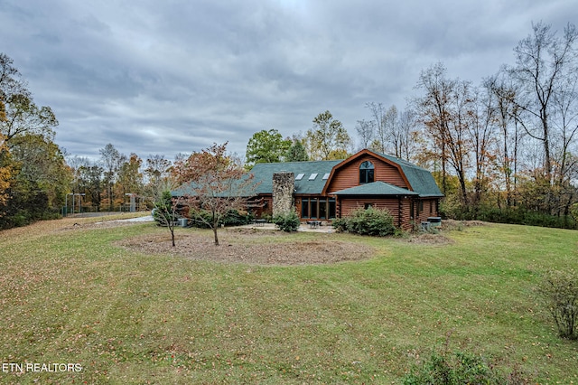 exterior space with a lawn