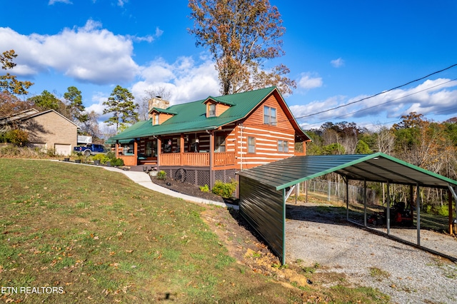 view of property exterior with a carport and a lawn