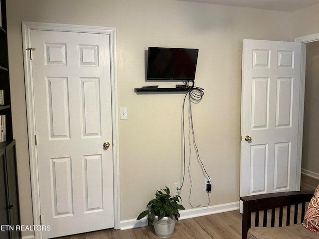 bedroom featuring hardwood / wood-style floors