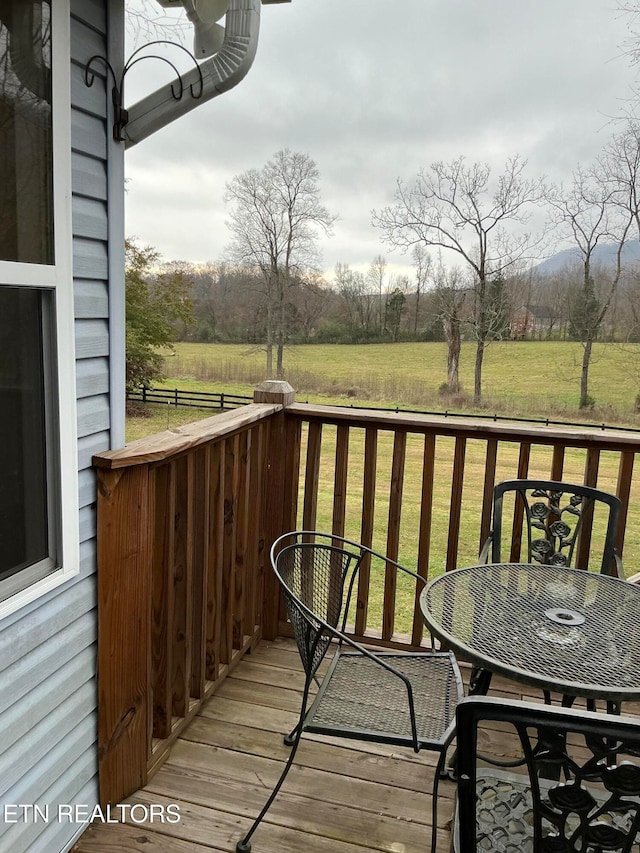 wooden balcony with a wooden deck