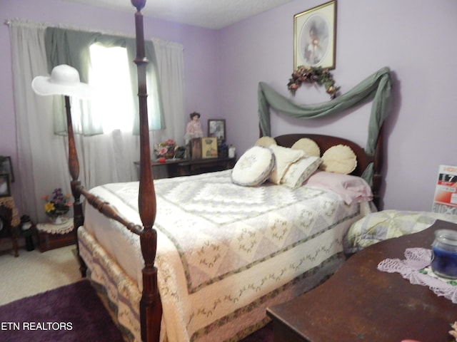 bedroom featuring carpet flooring