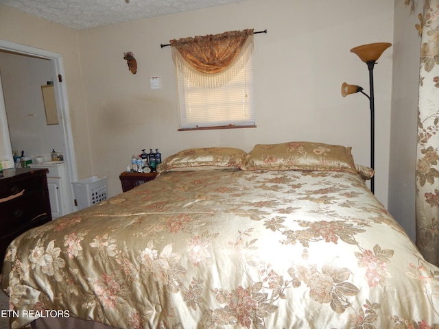 bedroom with a textured ceiling