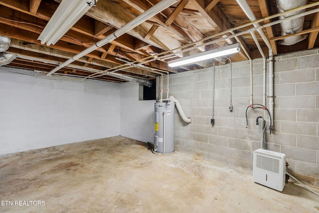 basement featuring electric water heater