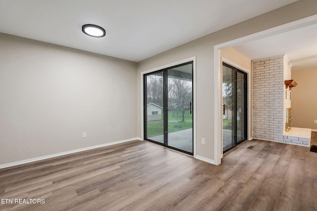 doorway with light hardwood / wood-style floors