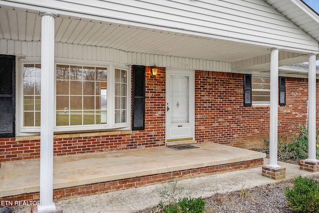 entrance to property with covered porch