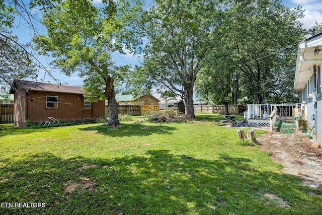 view of yard with a deck