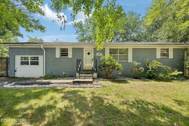 ranch-style house with a front lawn