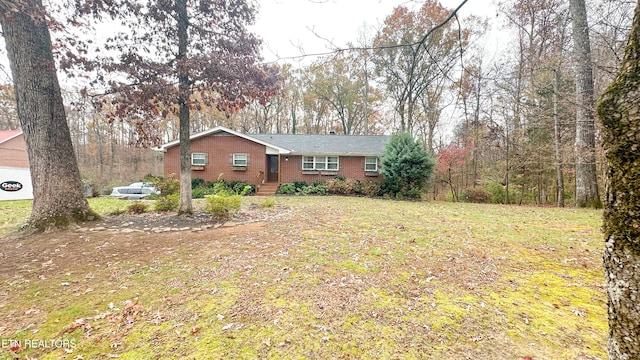 view of front of house with a front yard