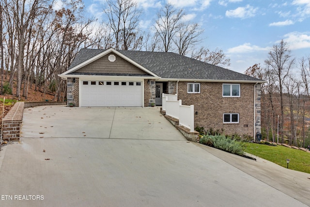 view of front of property with a garage