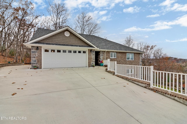 ranch-style home with a garage