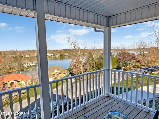 deck featuring a water view