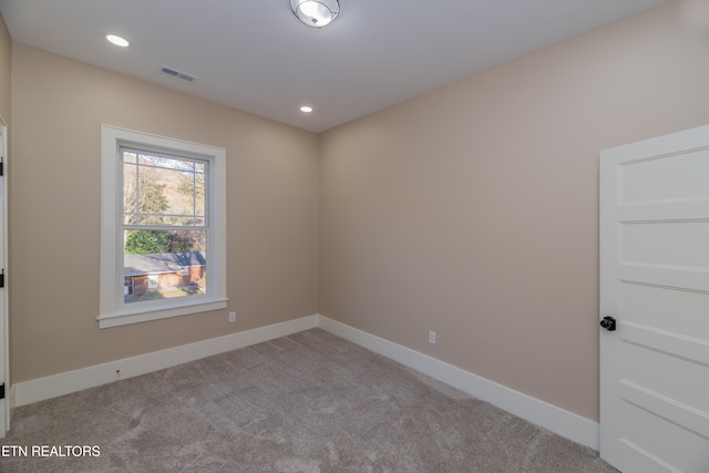 view of carpeted spare room