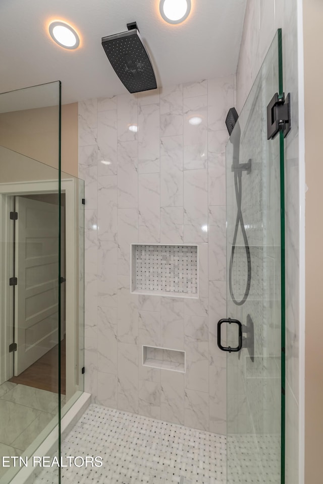 bathroom featuring walk in shower