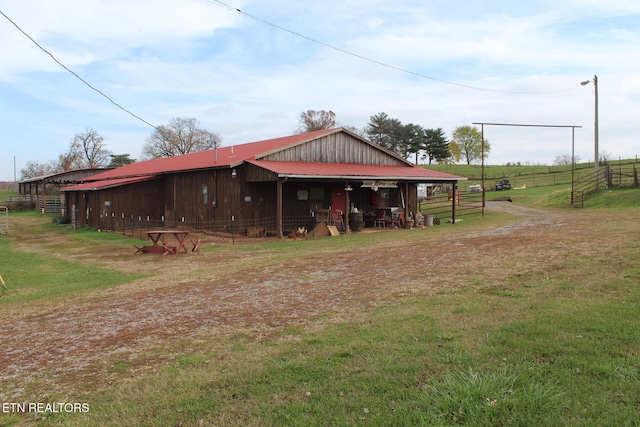 exterior space with a rural view