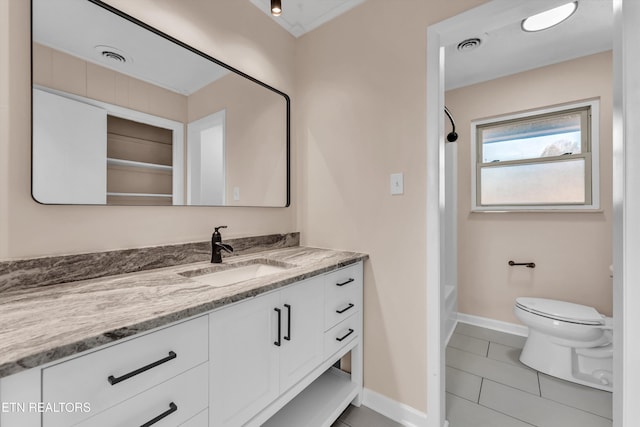 full bathroom with tile patterned flooring, vanity, shower / bath combination, and toilet