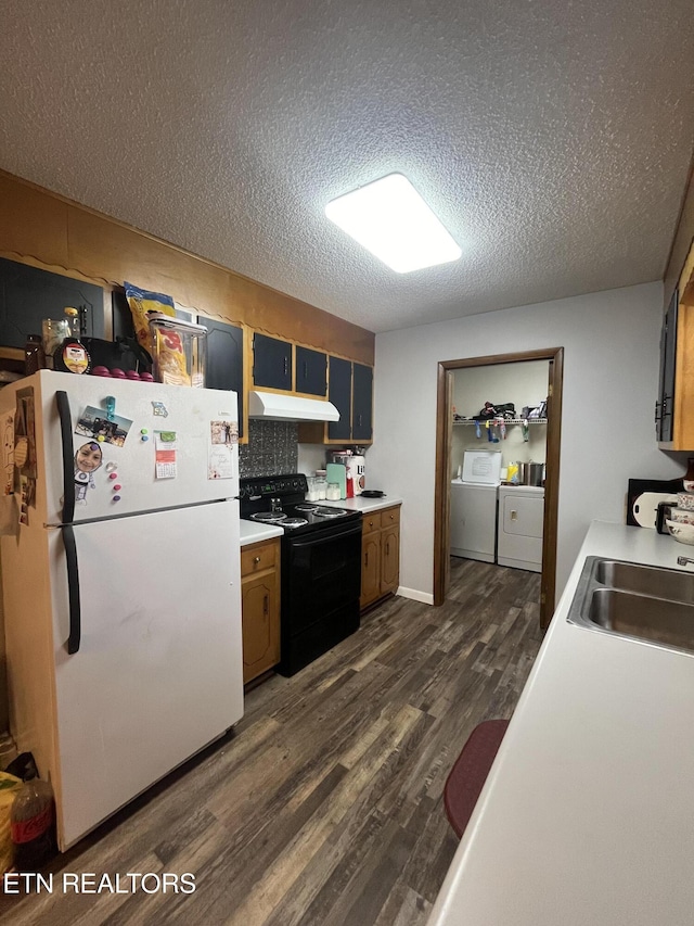 kitchen featuring dark wood-type flooring, sink, separate washer and dryer, white fridge, and black range with electric stovetop