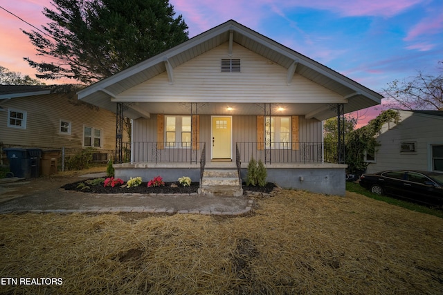 bungalow-style home with covered porch