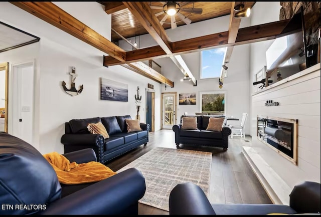 1448 Dover Ln, Dandridge, TN 37725 - living area with beamed ceiling, wood finished floors, a fireplace, and a ceiling fan
