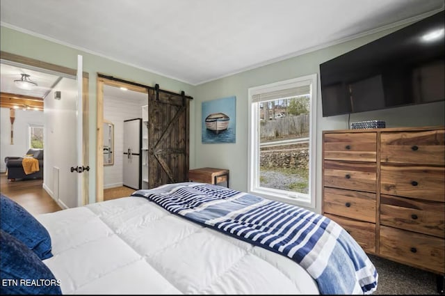 1448 Dover Ln, Dandridge, TN 37725 - bedroom with multiple windows, a barn door, and crown molding